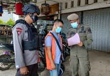 MELANGGAR PROTOKOL KESEHATAN